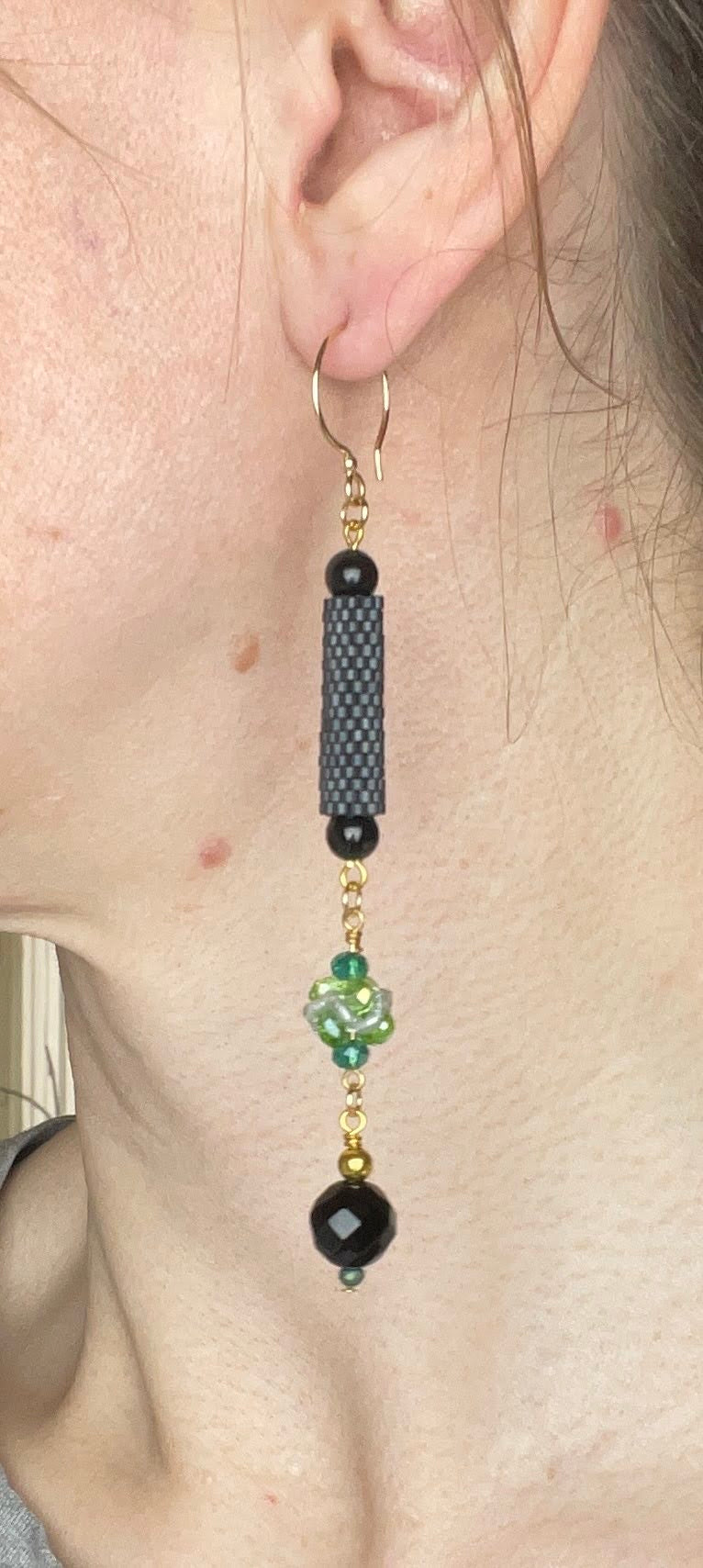 Earrings with beaded element