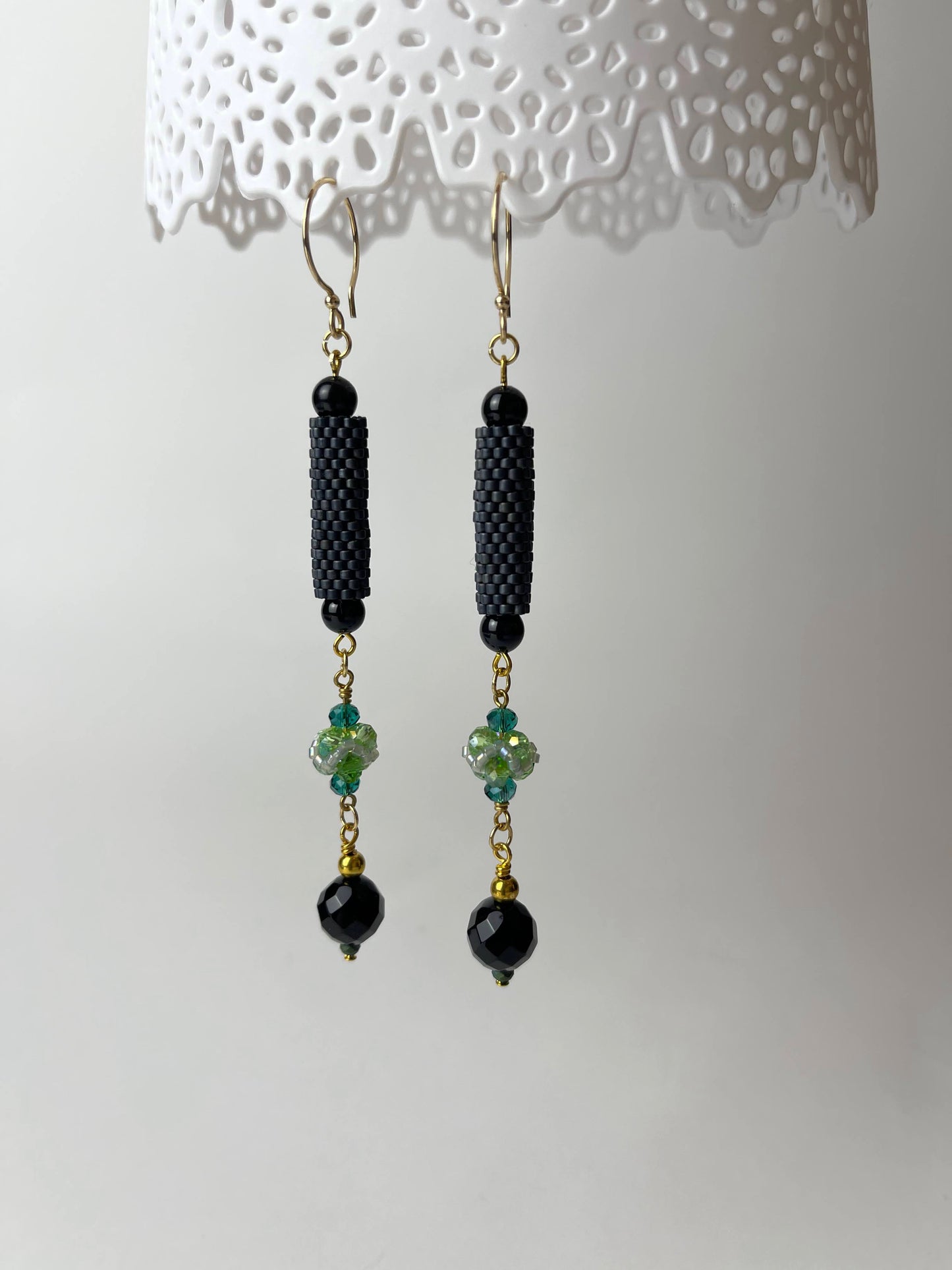 Earrings with beaded element