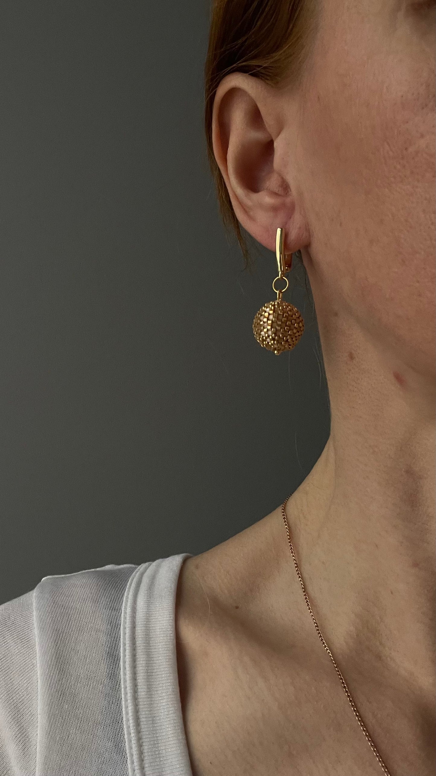 Round gold tone seed beads earrings