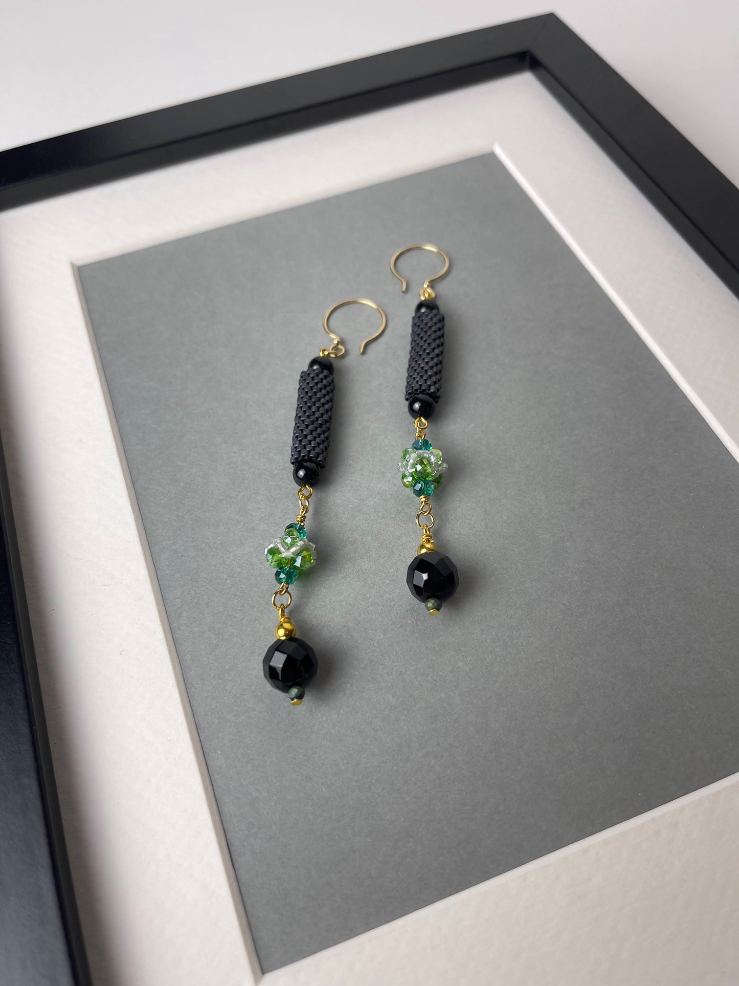 Earrings with beaded element