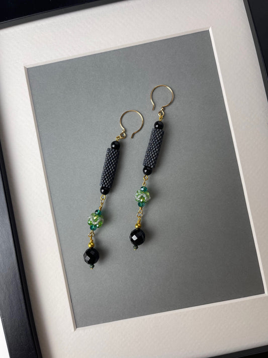 Earrings with beaded element
