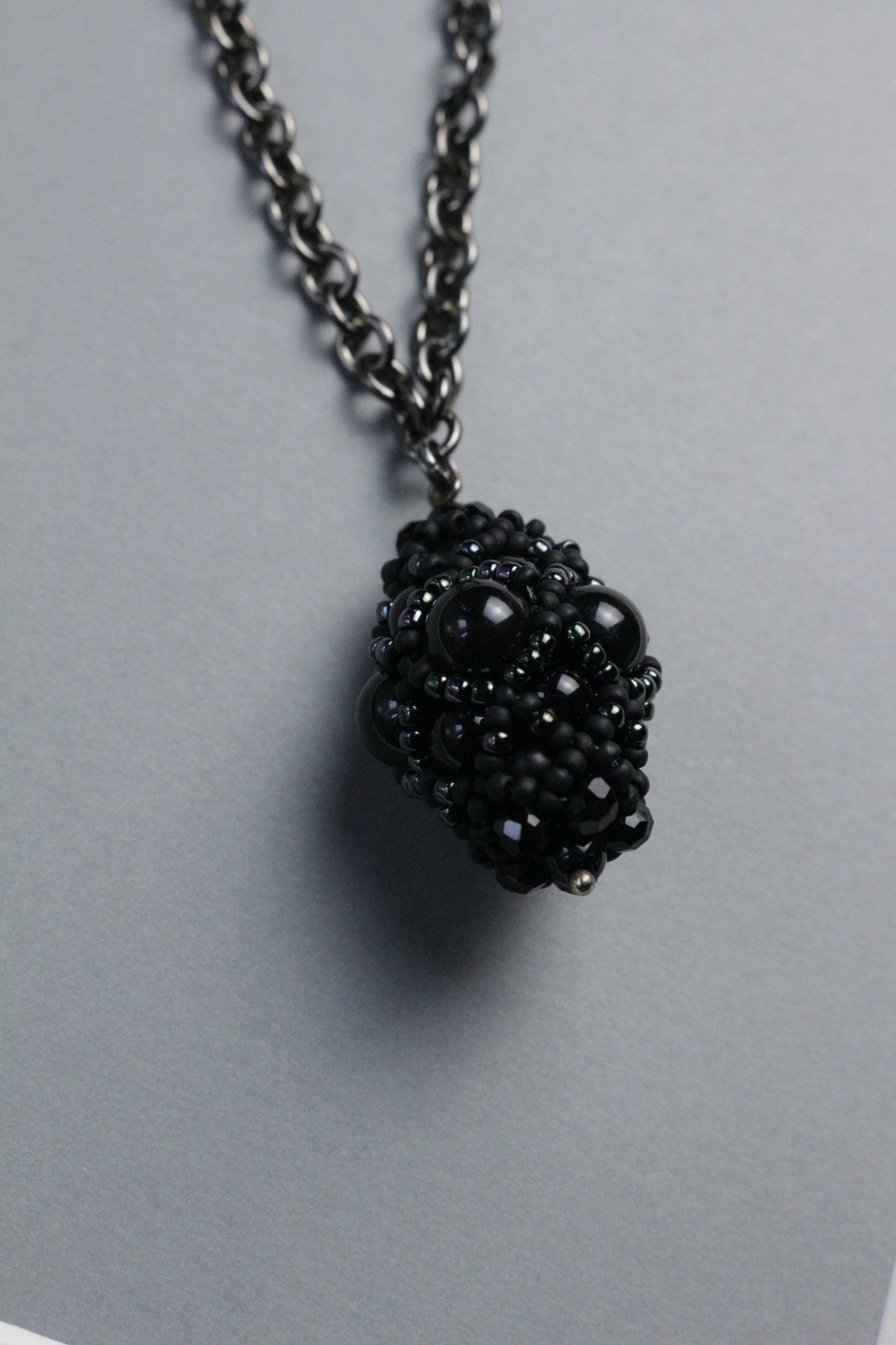Necklace with black beaded element
