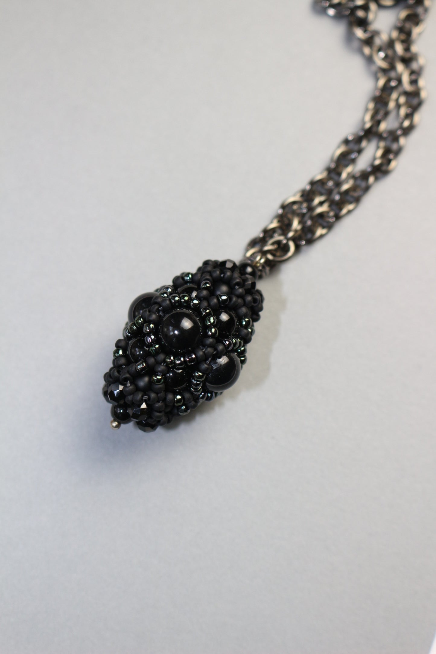Necklace with black beaded element